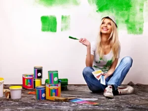 A girl with ready to working on wall painting dubai