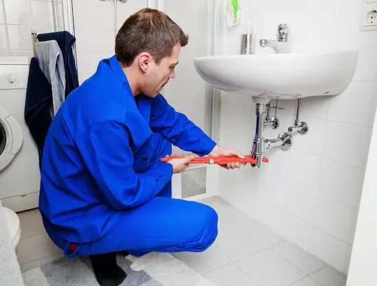 A man plumbers in Dubai providing plumbing services in Dubai